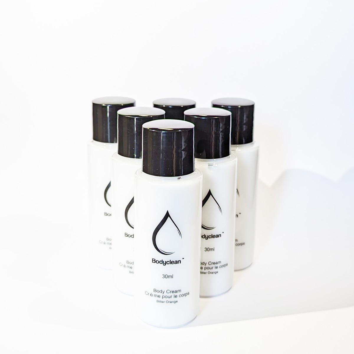 Pack de 100 cremas corporales bodyclean 30 ml aroma a naranja amarga