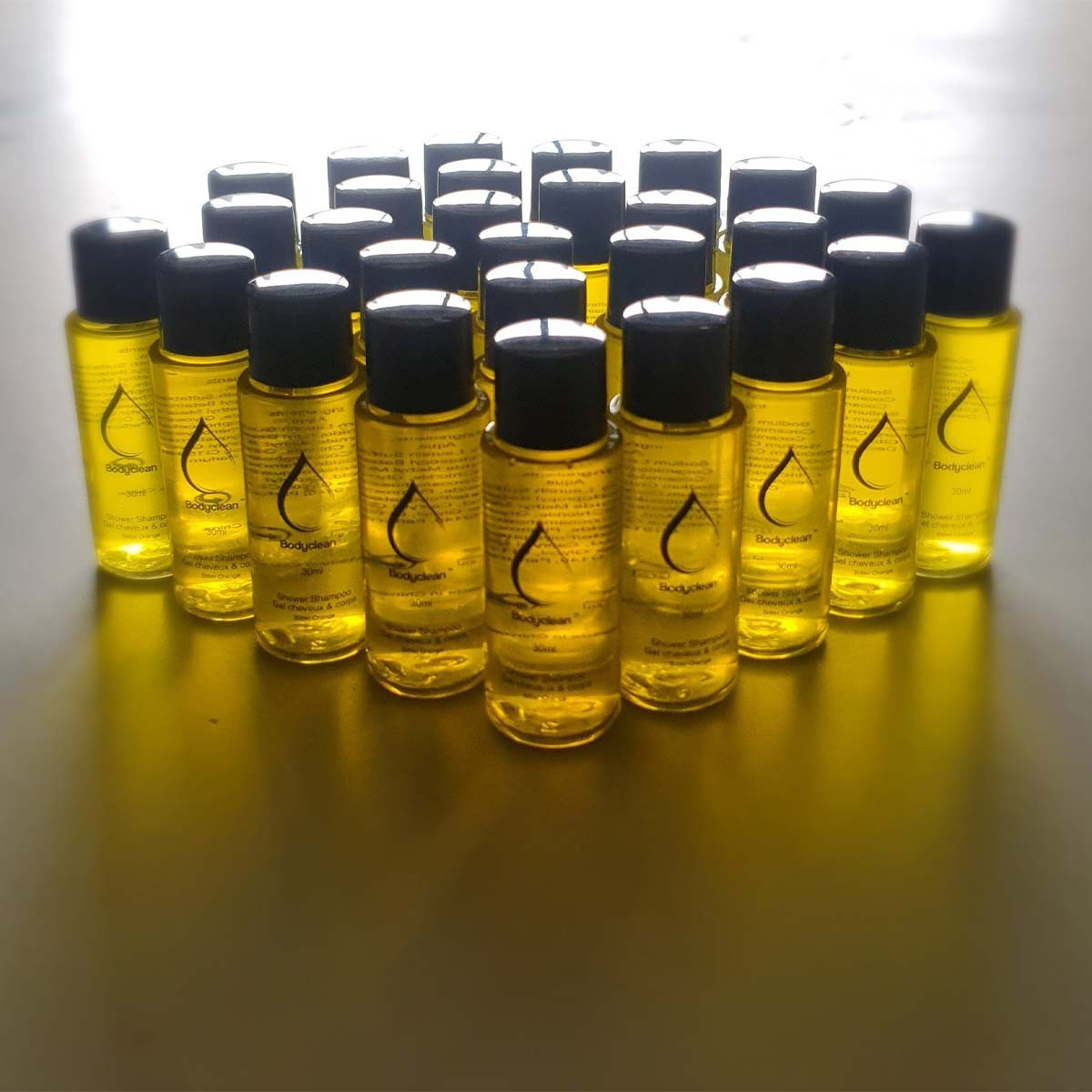 Lot de 50 bouteilles de shampoing bodyclean 30 ml parfum orange amère